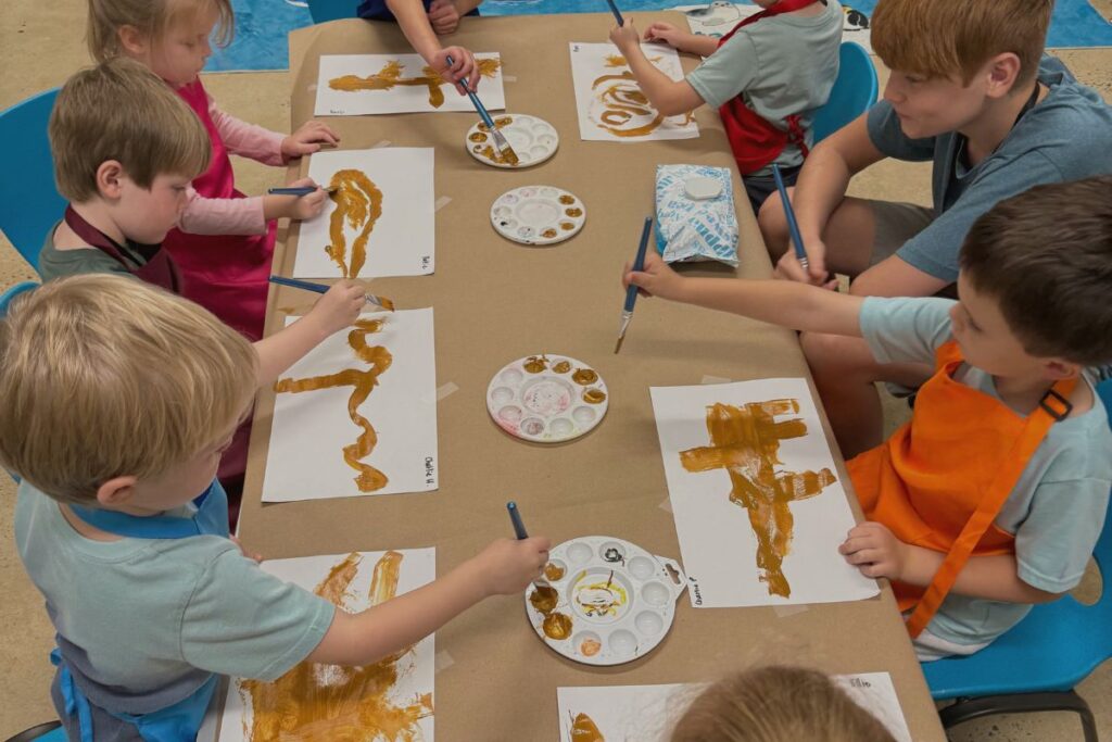 Homeschool children painting at Cedars Programs Enrichment Homeschool Community in Cookeville